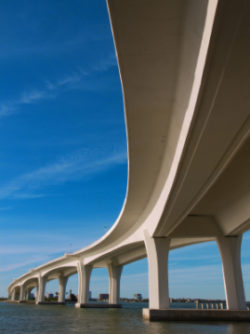 View from under the curved Bridge Overpass that goes over the water